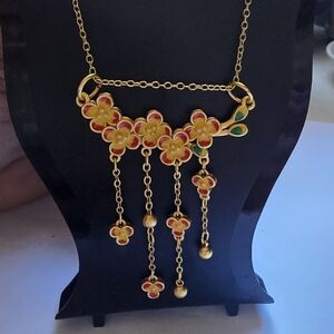 Elegant Floral Gold Necklace With Dangles